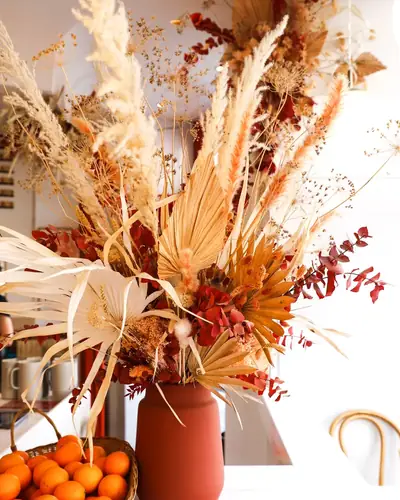 Dried flowers in Oma's bright dining room, rue Beaurepaire